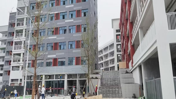 成都中天達木業丨華通成愛思瑟國際學校工程木門案例